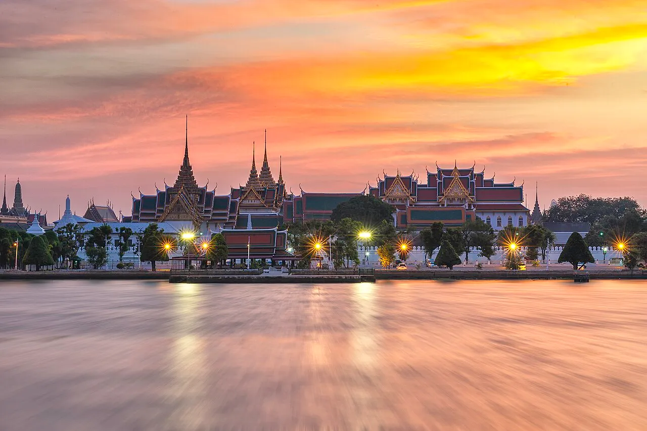 The Grand Palace and Wat Phra Kaew (Temple of the Emerald Buddha) skyline in Bangkok, seen from outside the walls.