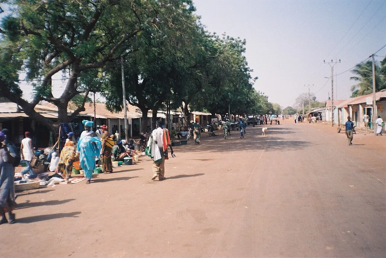 The main road through Farafenni, a border town in the Gambia.
