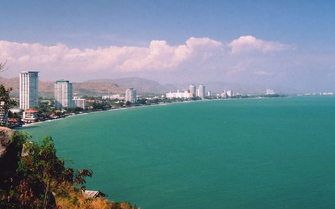 Hua Hin's beachfront hotels seen from Khao Takiab rock south of the town.