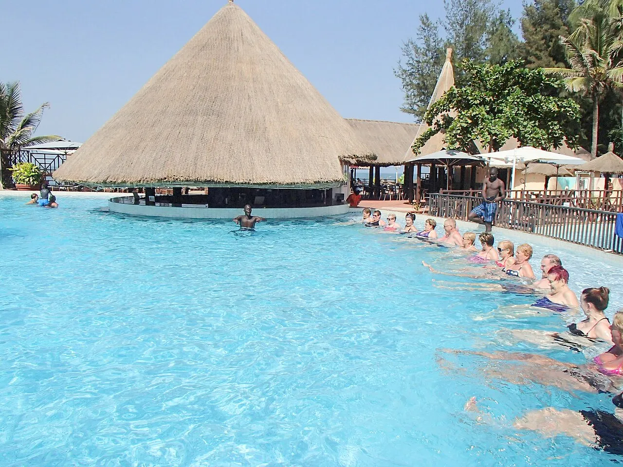 Tourists in the swimming pool of a beach hotel on the Senegambia strip.