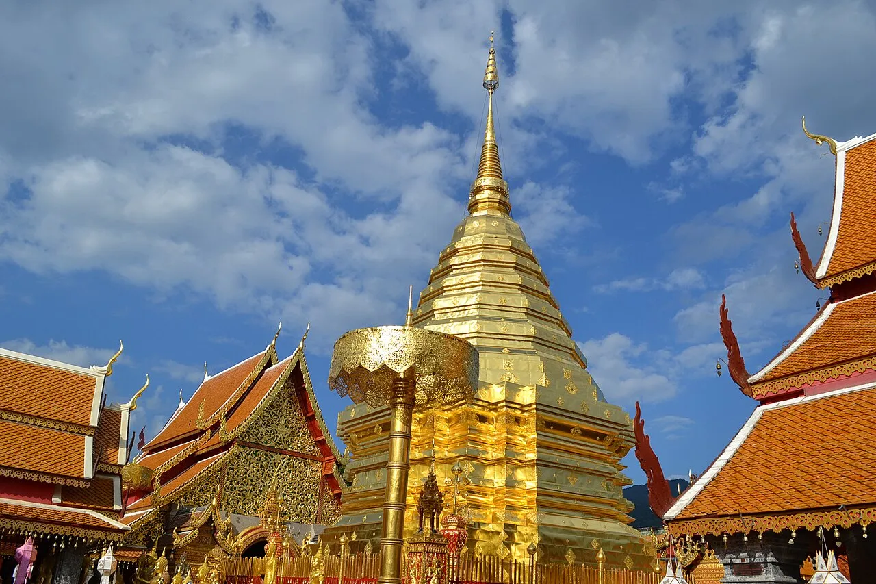 The golden chedi of Wat Phrathat Doi Suthep temple on the mountainside above Chiang Mai.