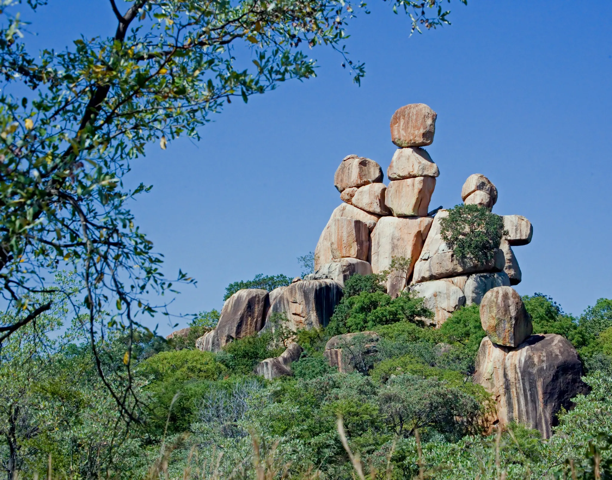 Granite boulders balanced on top of each other at the "Mother and Child Rock" formation in Matobo National Park, Zimbabwe.