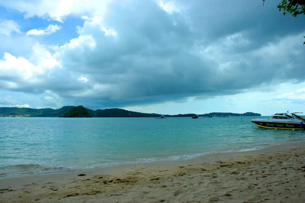 Phuket Island seen across the water from the smaller neighbouring island of Koh Lon.