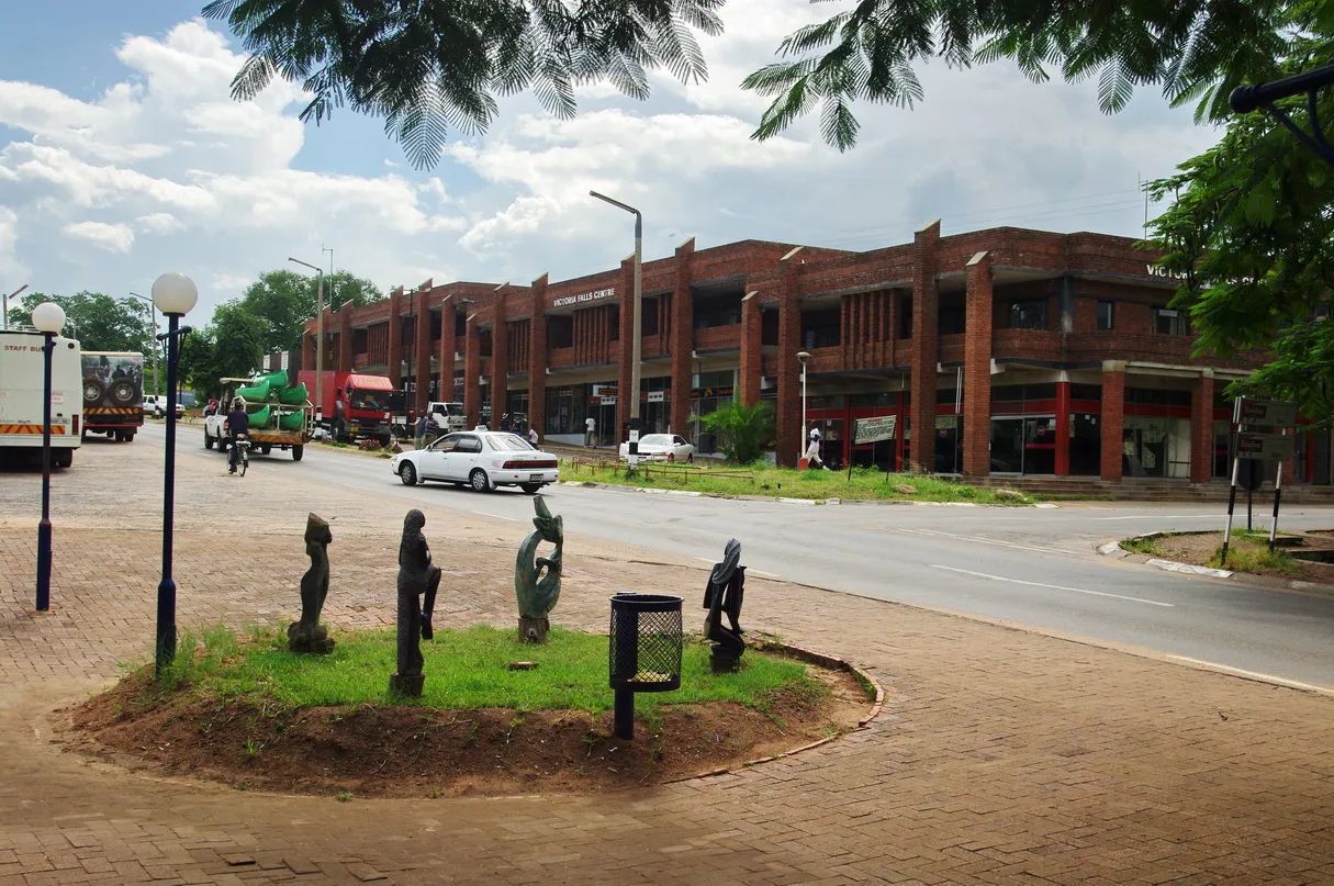 A street in the town of Victoria Falls, Zimbabwe, near the border with Zambia.